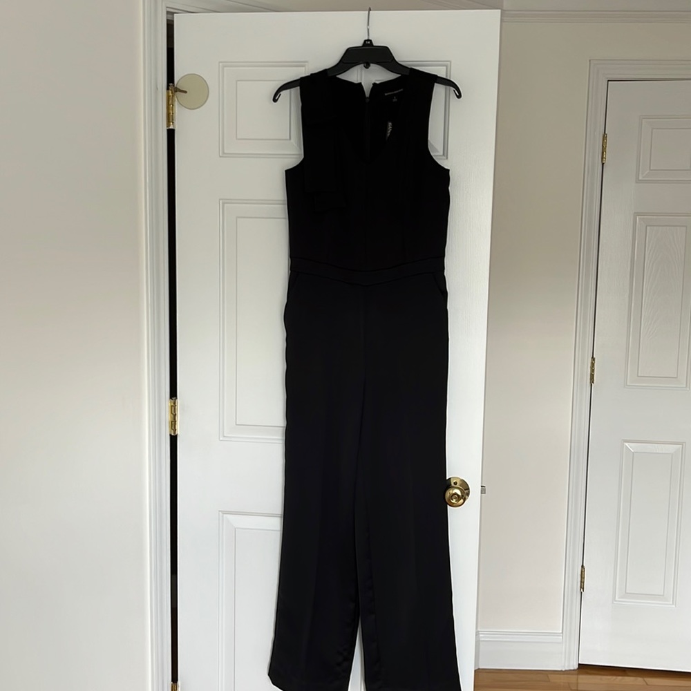 Woman’s Dressy one piece jumpsuit . Size 2